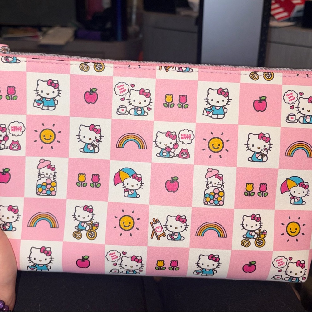 NWOT Hello Kitty Pink Checkerboard make up bag with Rainbow & Sun Icons
